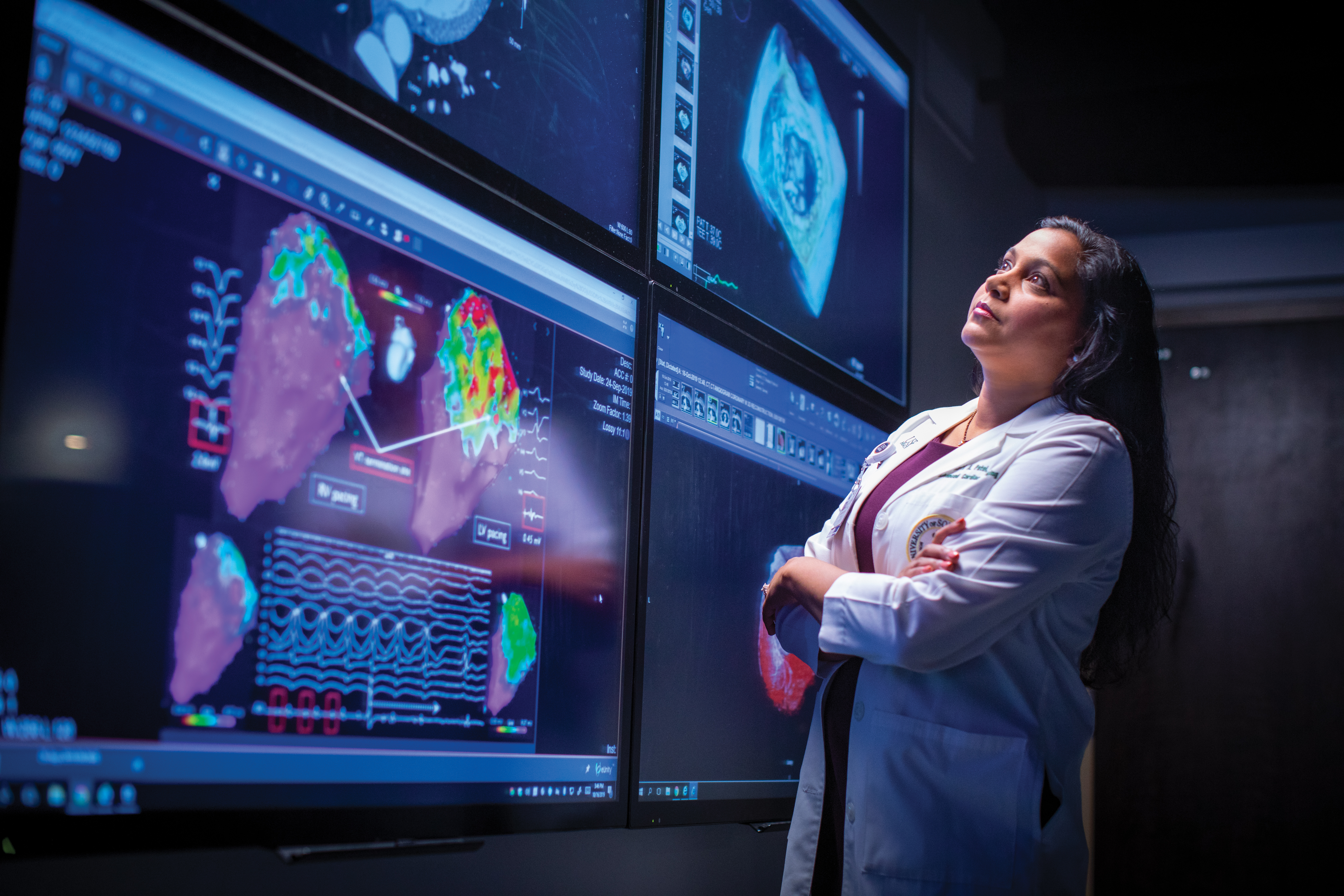 Physician looking at scans