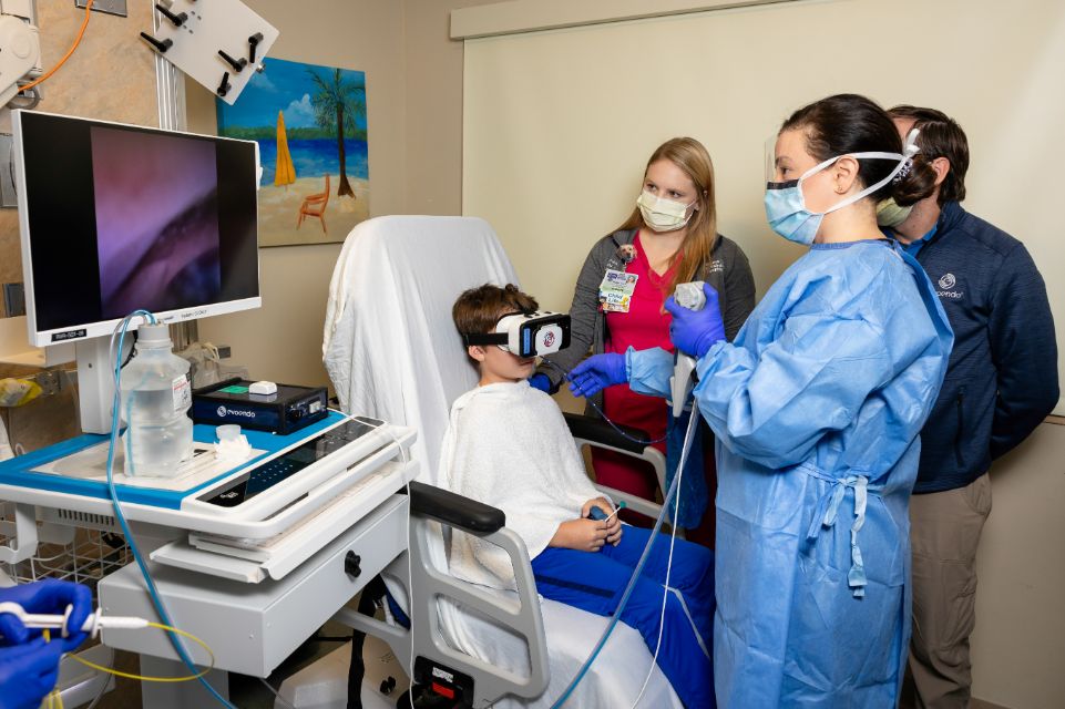 Dr. Racha Khalaf performs a transnasal endoscopy procedure on a pediatric patient in the Muma Children's Hospital at TGH.