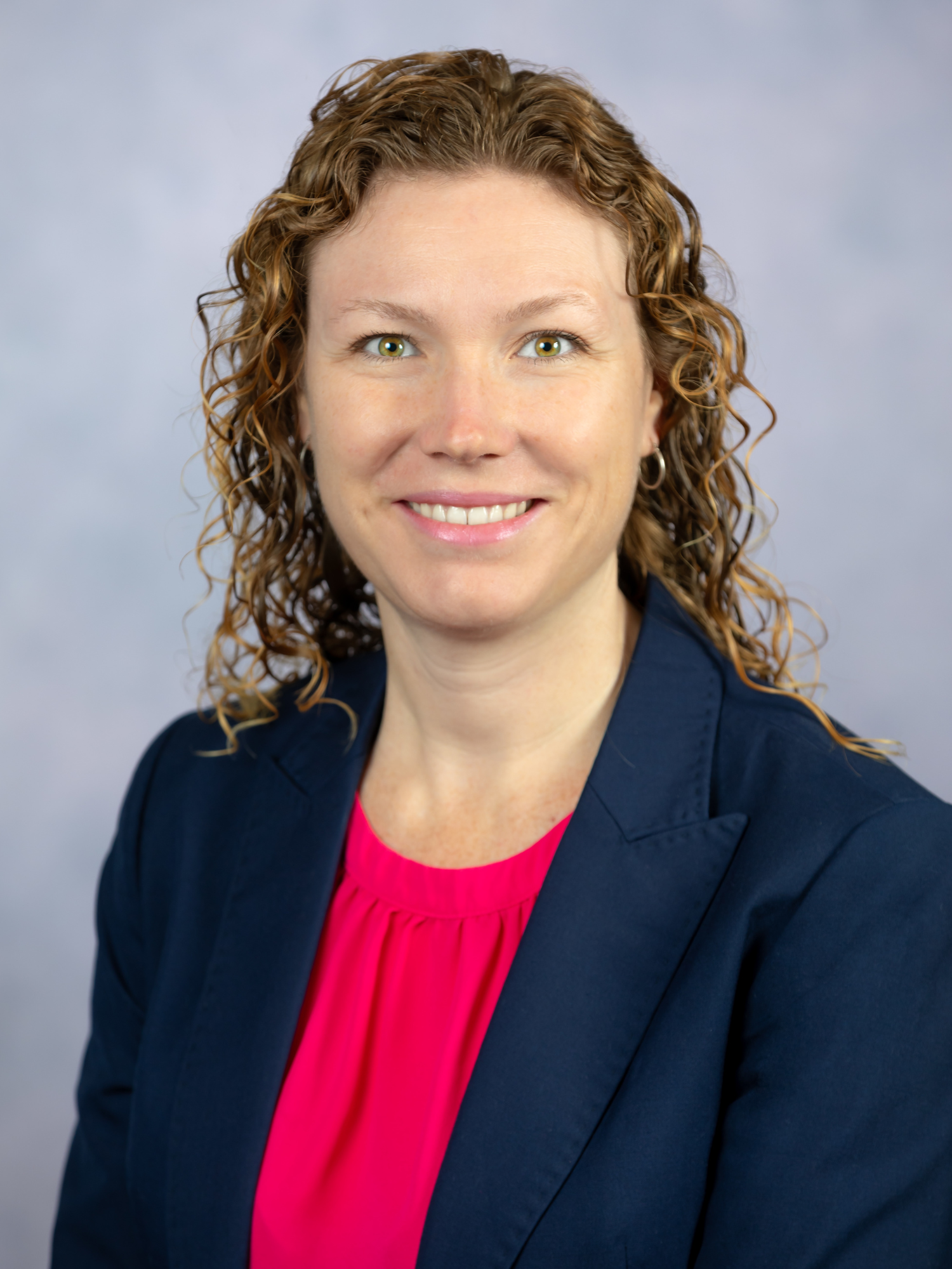 dr. asa oxner headshot in professional attire