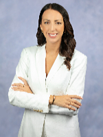 jennifer crabtree headshot with gray studio backdrop