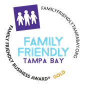 family friendly tampa bay badge with icon of family and text that reads family friendly business award gold and familyfriendlytampabay.org in a circular format