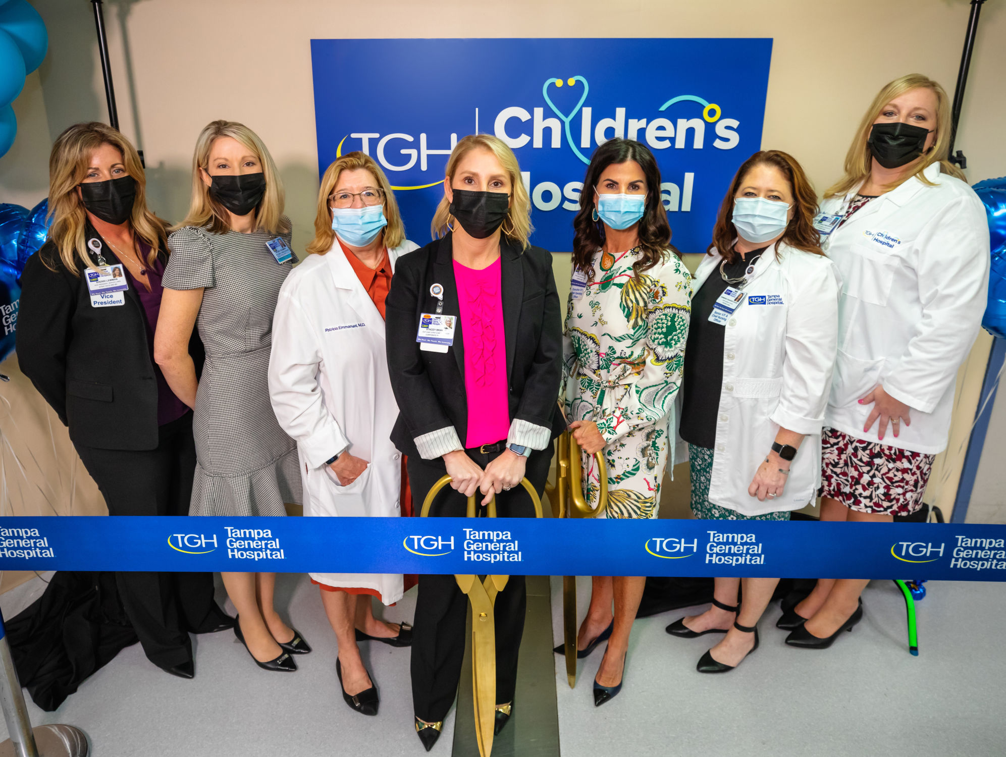 Group of TGH employees at ribbon cutting
