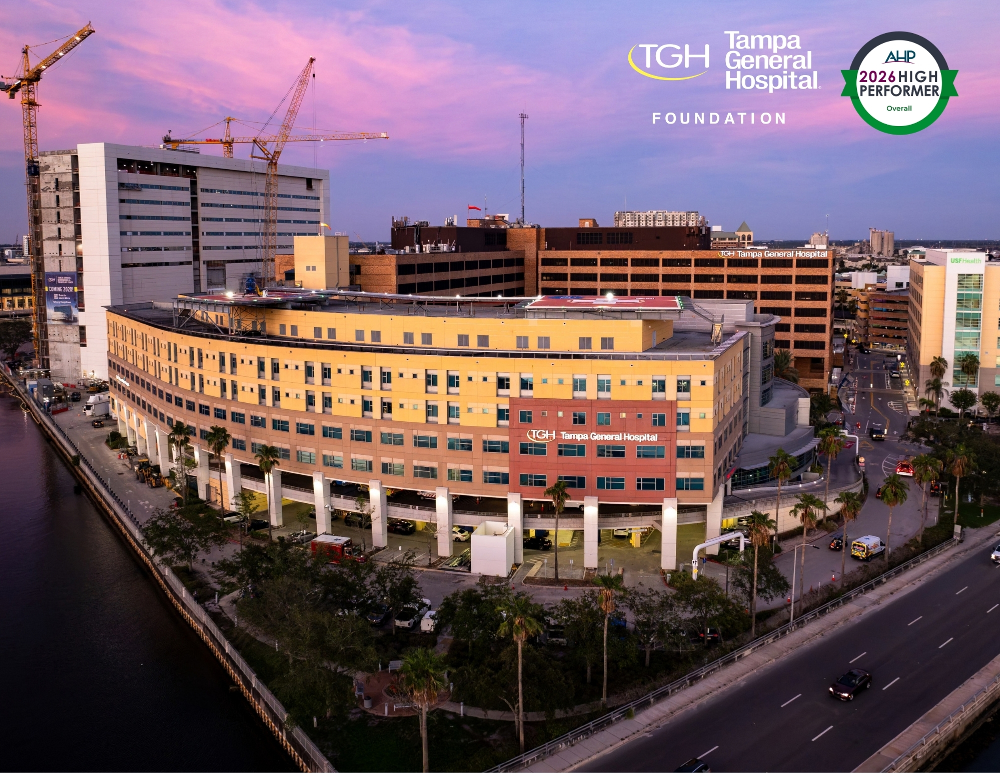 Campus photo of Tampa General Hospital with Association for Healthcare Philanthropy recognition logo.