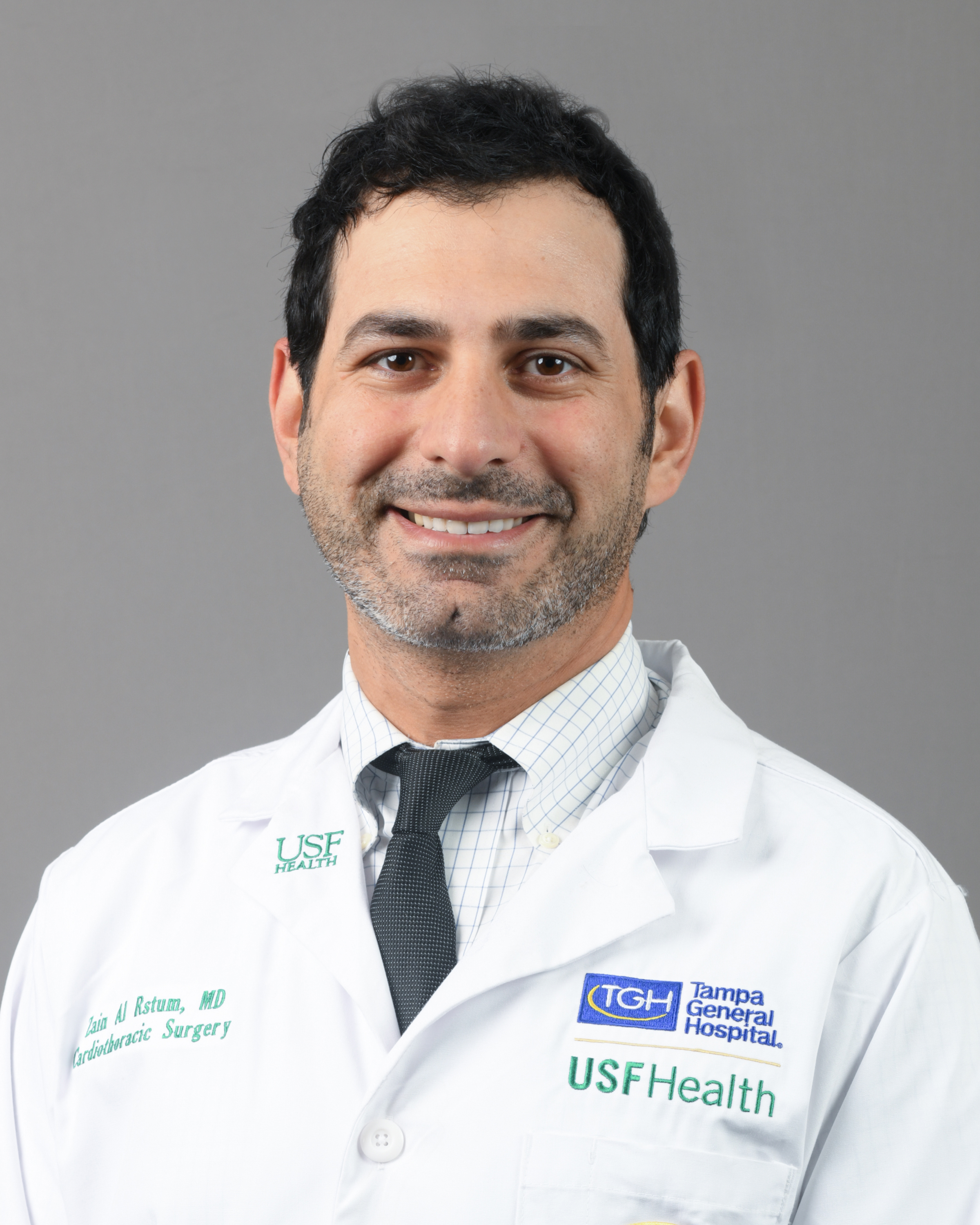 Professional headshot of Dr. Zain Al Rstum, who is a male cardiovascular surgeon at the TGH Heart & Vascular Institute.