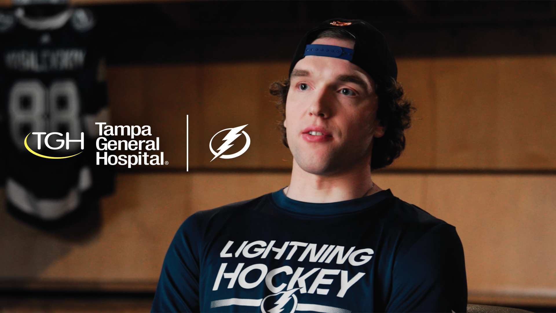 andrei vasilevskiy in tampa bay lightning locker room for interview with tampa general hospital