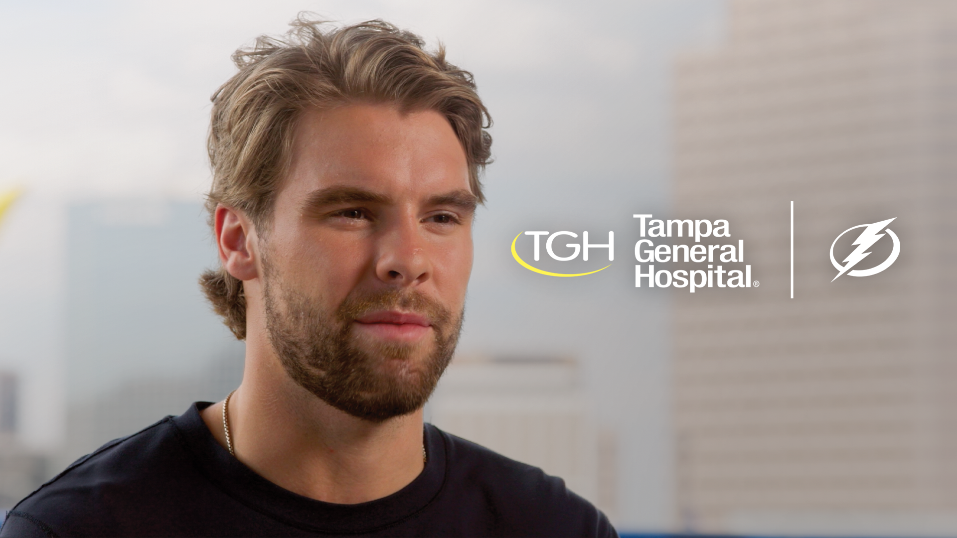 brandon hagel outside amalie arena for interview with tampa general hospital