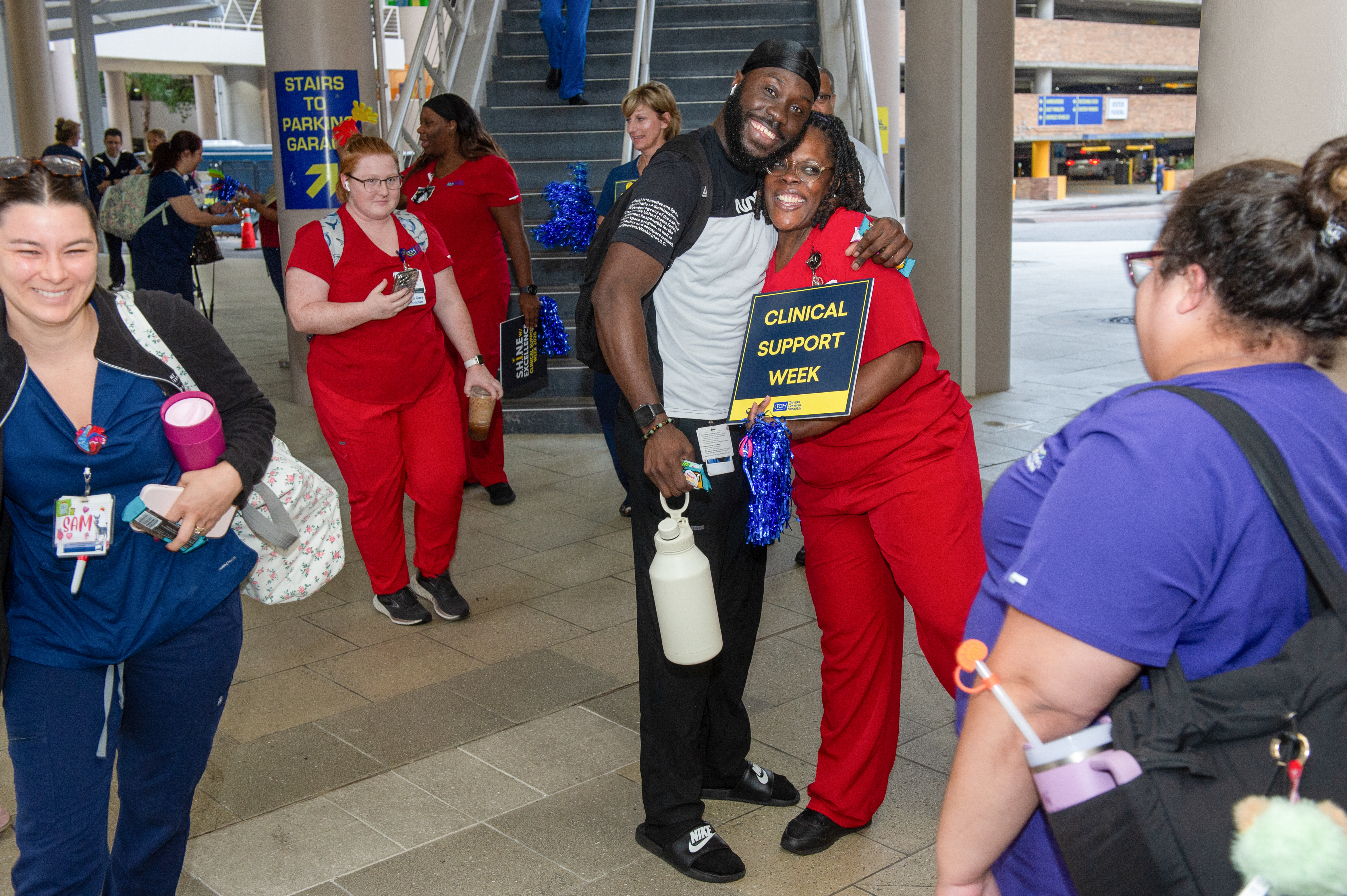 Team members arrive for Tampa General Hospital's Clinical Support Week kickoff event in July 2026.