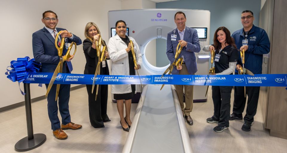 Doctors and executives from Tampa General Hospital celebrate the addition of two GE Healthcare Revolution APEX 512-Slice computed tomography (CT) scanners.