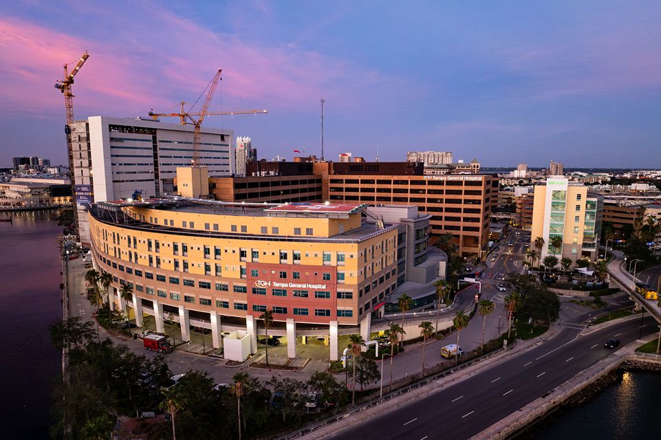 A photo of Tampa General Hospital taken at sunset.