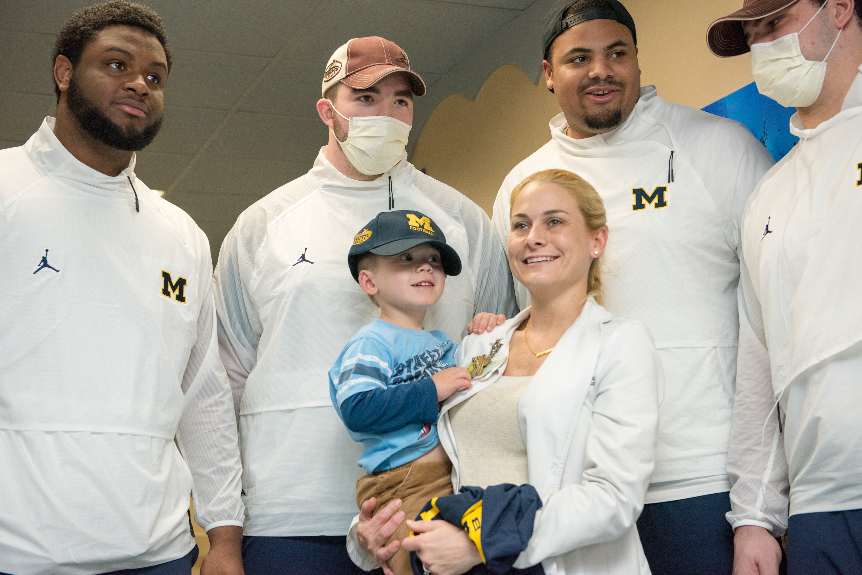 Outback bowl players with young male patient