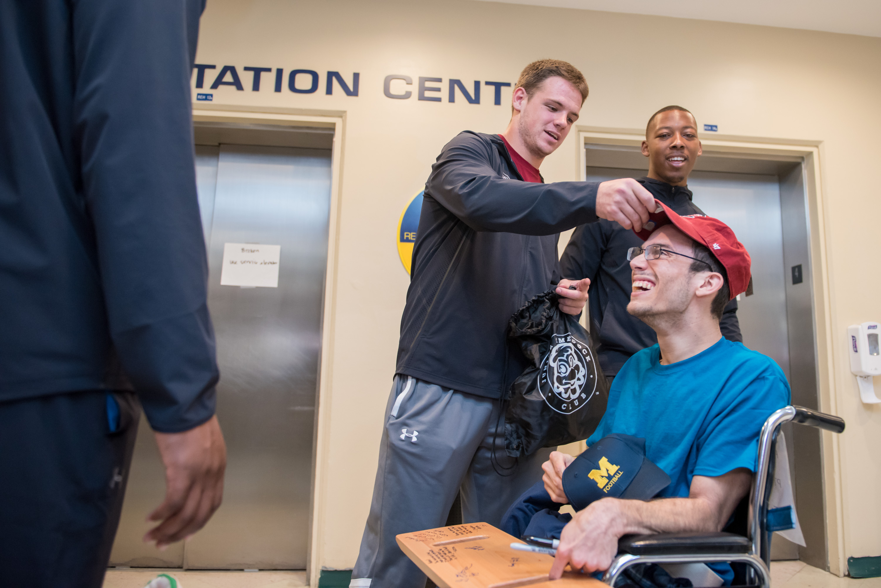 Outback bowl players visits male patient
