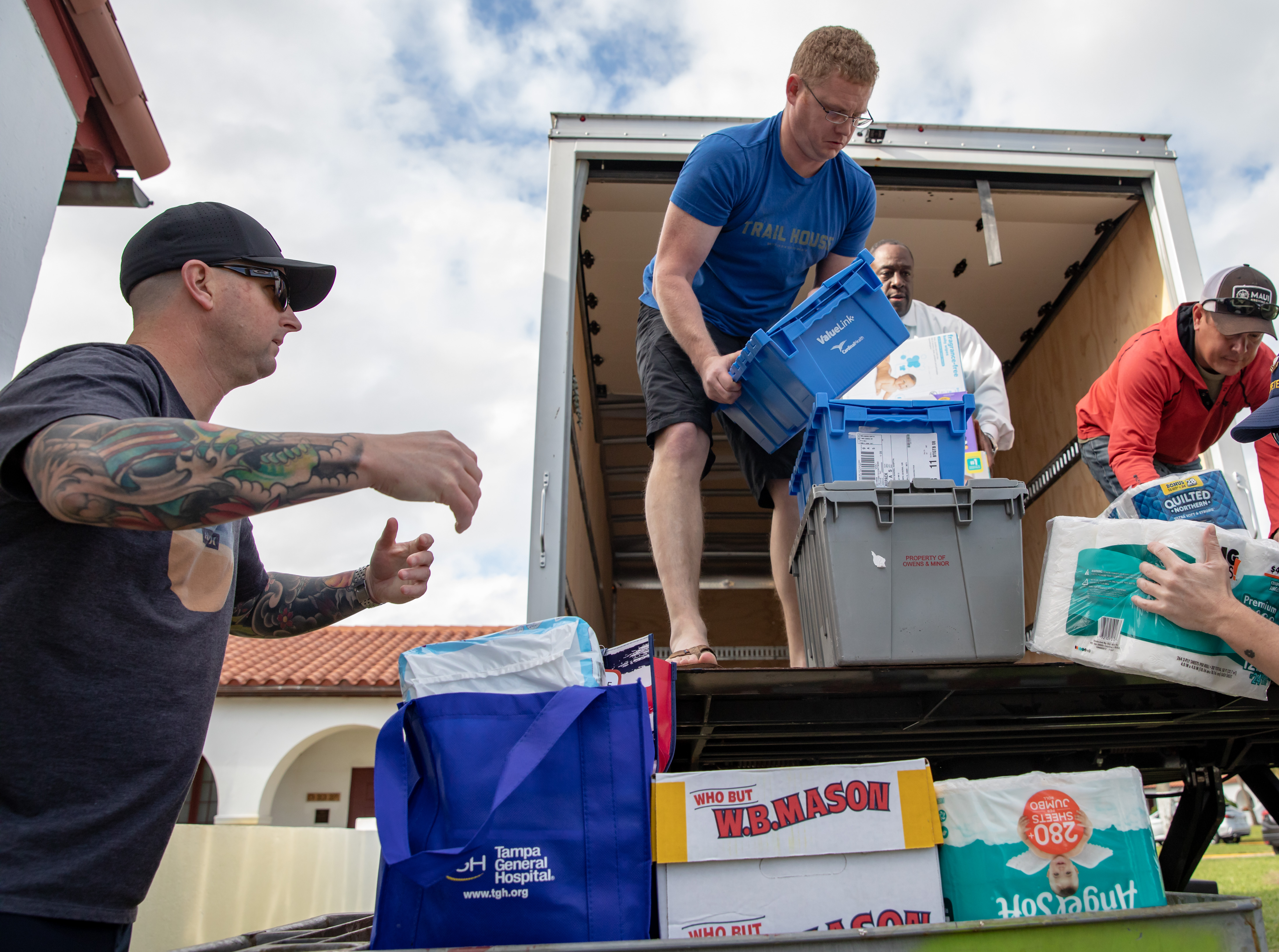 The donated goods arrive at the U.S. Coast Guard Base in St. Petersburg.