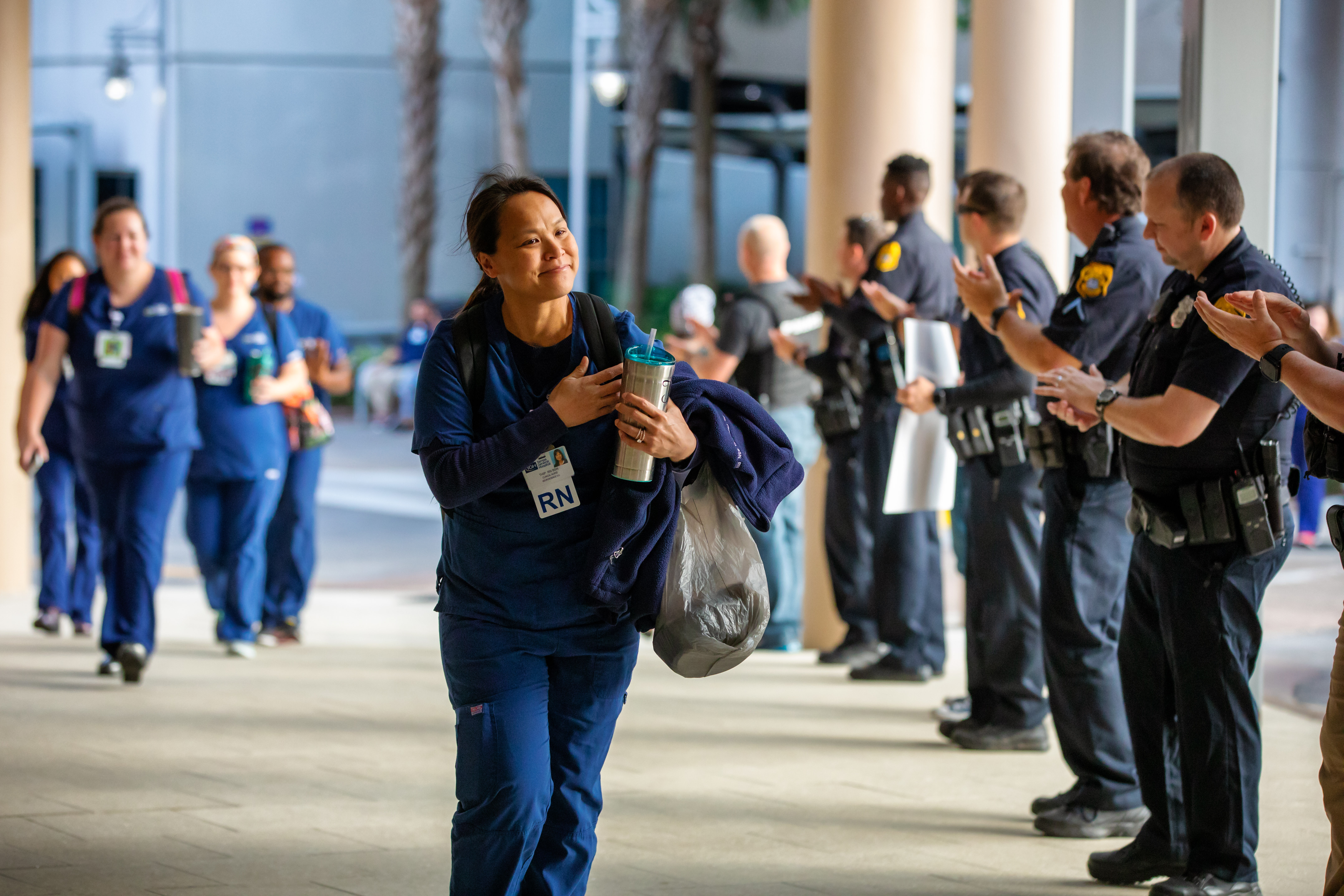 TGH staff walking into work