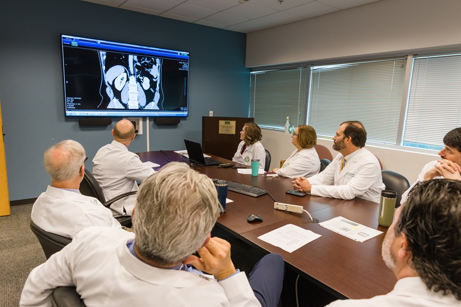 dr john jacobs leads a treatment discussion with the colon and rectal surgery team