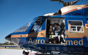 USF Patel Partnership first graders Samantha, 7, left, and Janet, 7, check out the inside of Tampa General Hospital’s Aeromed helicopter.