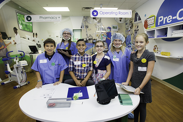 Children dressed as doctors at the Muma JA BizTown