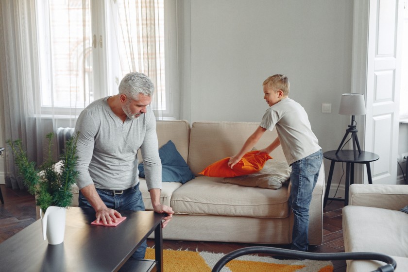 photo-of-man-cleaning-table-3890170