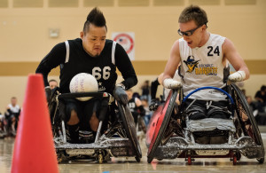 2 men playing wheelchair rugby