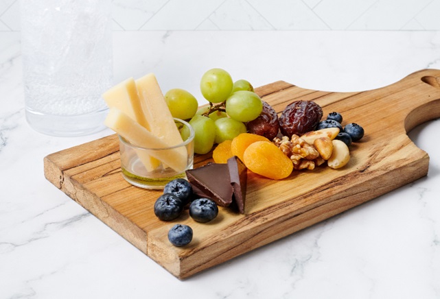 Mix of fruits, cheeses, nuts, and chocolate in Dr. Sharma's Mindful Mix from the new TGH patient menu