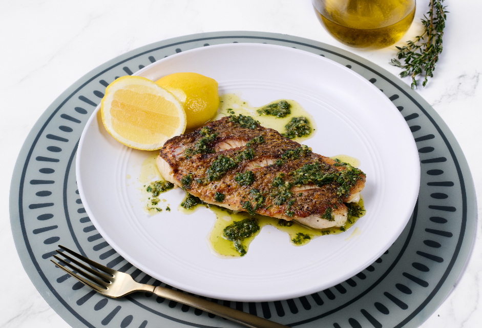 Grilled Gulf Snapper with salsa verde, olive tapenade, and lemon zest from Tampa General Hospital’s new menu.