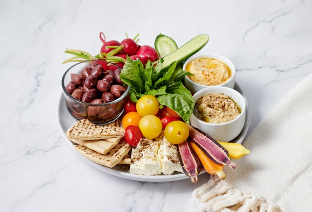 Mediterranean Mezze Platter with hummus, baba ghanoush, feta, olives, and za’atar pita from Tampa General Hospital’s new menu.