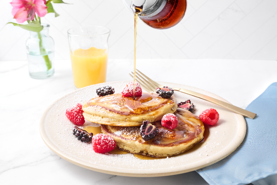Perfect Pancakes topped with fresh berries and maple syrup from Tampa General Hospital’s new patient menu.