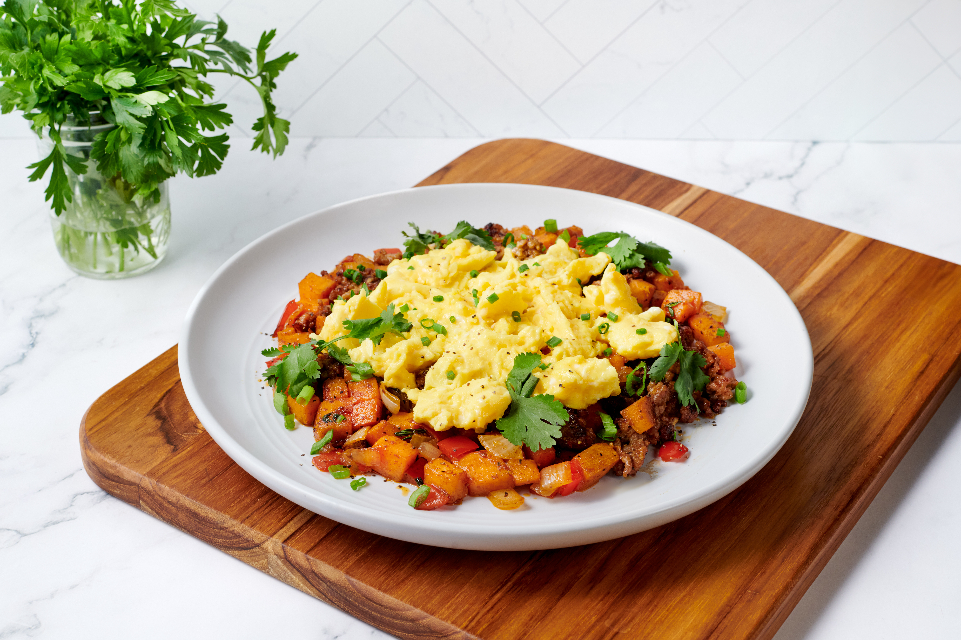 Sausage & Sweet Potato Hash with cage-free eggs, bell peppers, and sweet potatoes from Tampa General Hospital’s new menu.