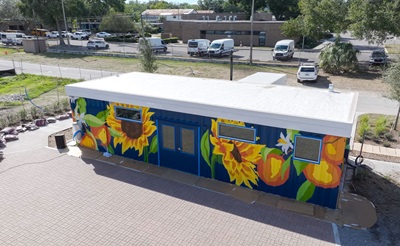TampaWell Food Pharmacy exterior image of mural painting