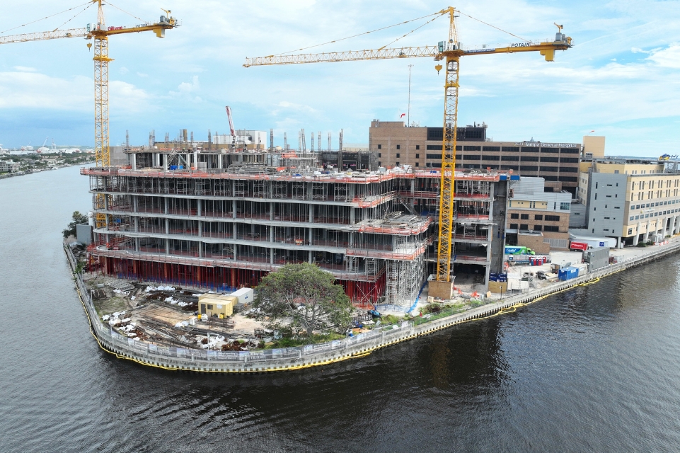TGH Taneja Surgical, Neuroscience & Transplant Tower under construction with TGH Davis Islands campus in background
