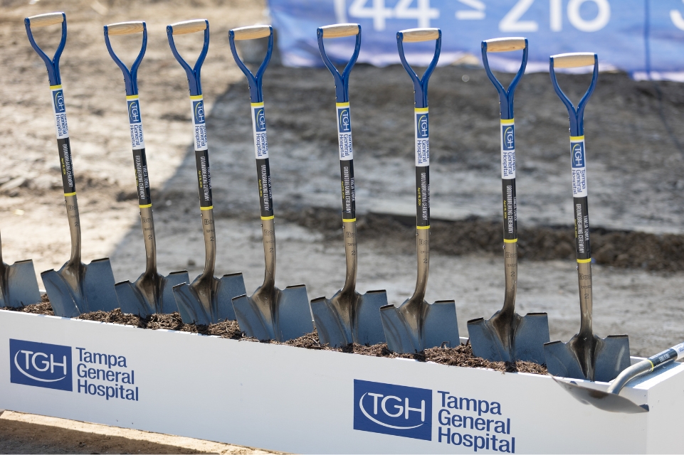 cermonial shovels in a garden bed filled with dirt at the TGH Taneja Surgical, Neuroscience & Transplant Tower groundbreaking ceremony